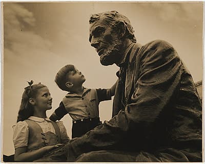 Anton BRUEHL | not titled [Two children looking at Abraham Lincoln statue]