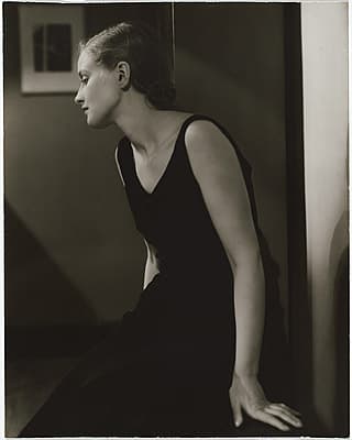 Anton BRUEHL | not titled [Portrait of a young woman in black evening dress]