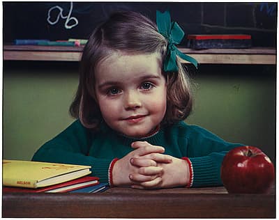 Anton BRUEHL | not titled [Little girl in front of blackboard]