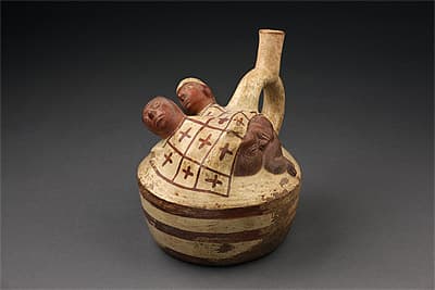   | Stirrup vessel in the form of a couple under a blanket