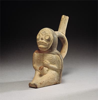   | Stirrup vessel in the form of a dead man masturbating