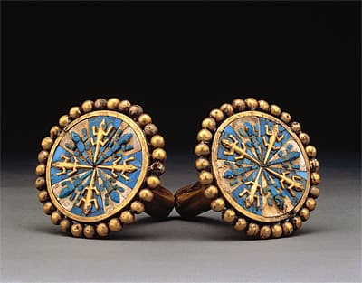   | Pair of ear ornaments