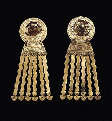   | Pair of ear ornaments