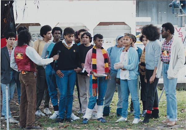 Michael RILEY | AIDT Dancers [group of people, one holding microphone]