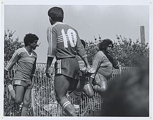 Michael RILEY | Redfern Oval Nerves [football players warming up - smoking], c. 1983