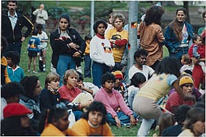 Michael RILEY | Protest March [group of people sitting on grass at Central]